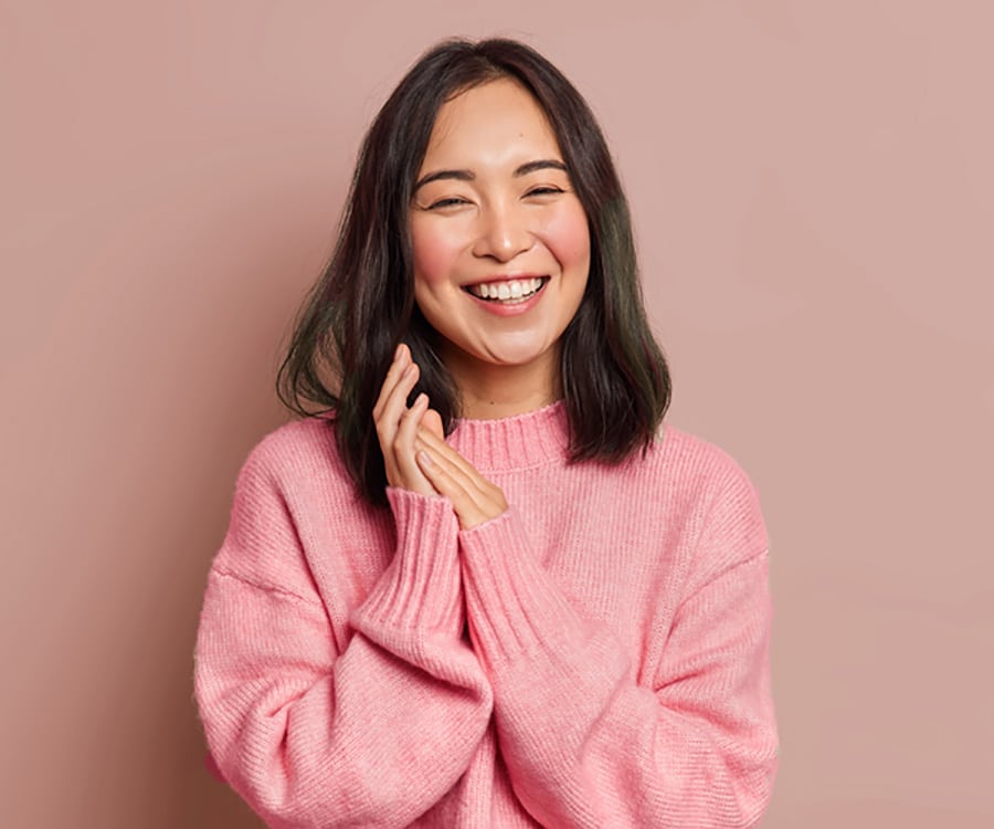 Girl in pink sweater